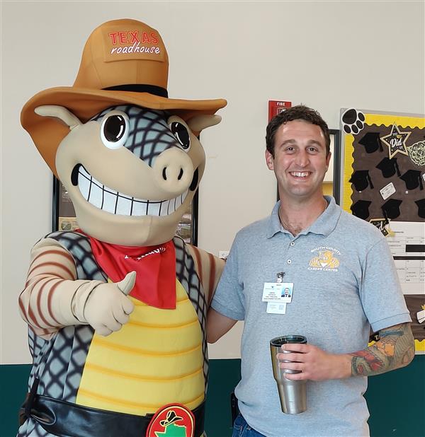 adult with andy the armadillo